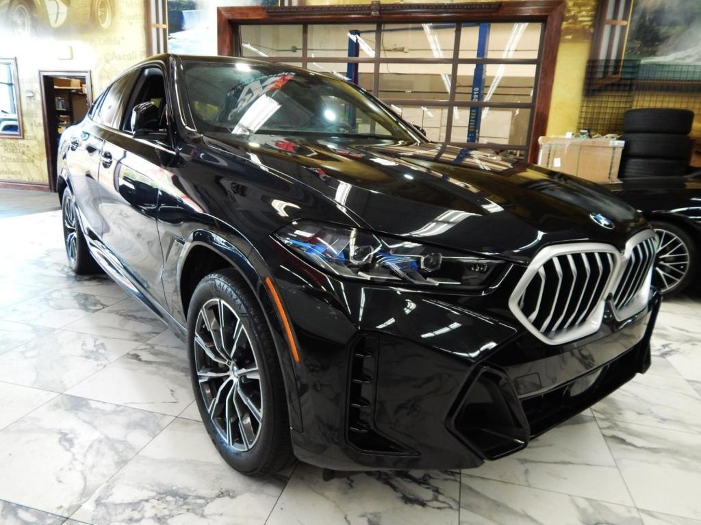 used 2025 BMW X6 car, priced at $55,995