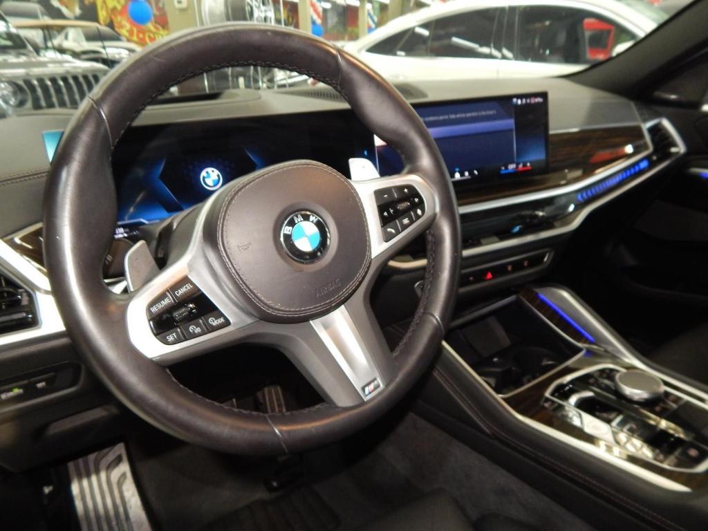 used 2025 BMW X6 car, priced at $55,995