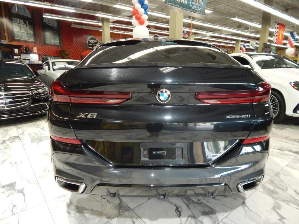 used 2025 BMW X6 car, priced at $55,995
