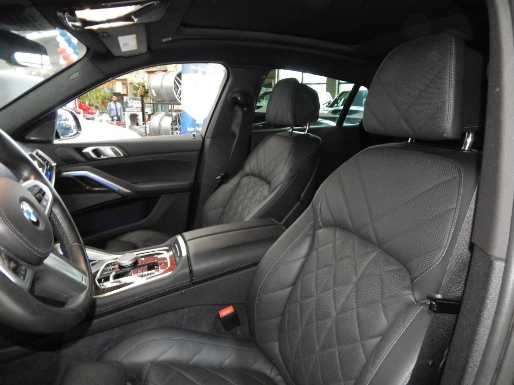 used 2025 BMW X6 car, priced at $55,995
