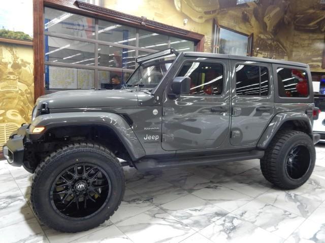 used 2021 Jeep Wrangler Unlimited car, priced at $33,821