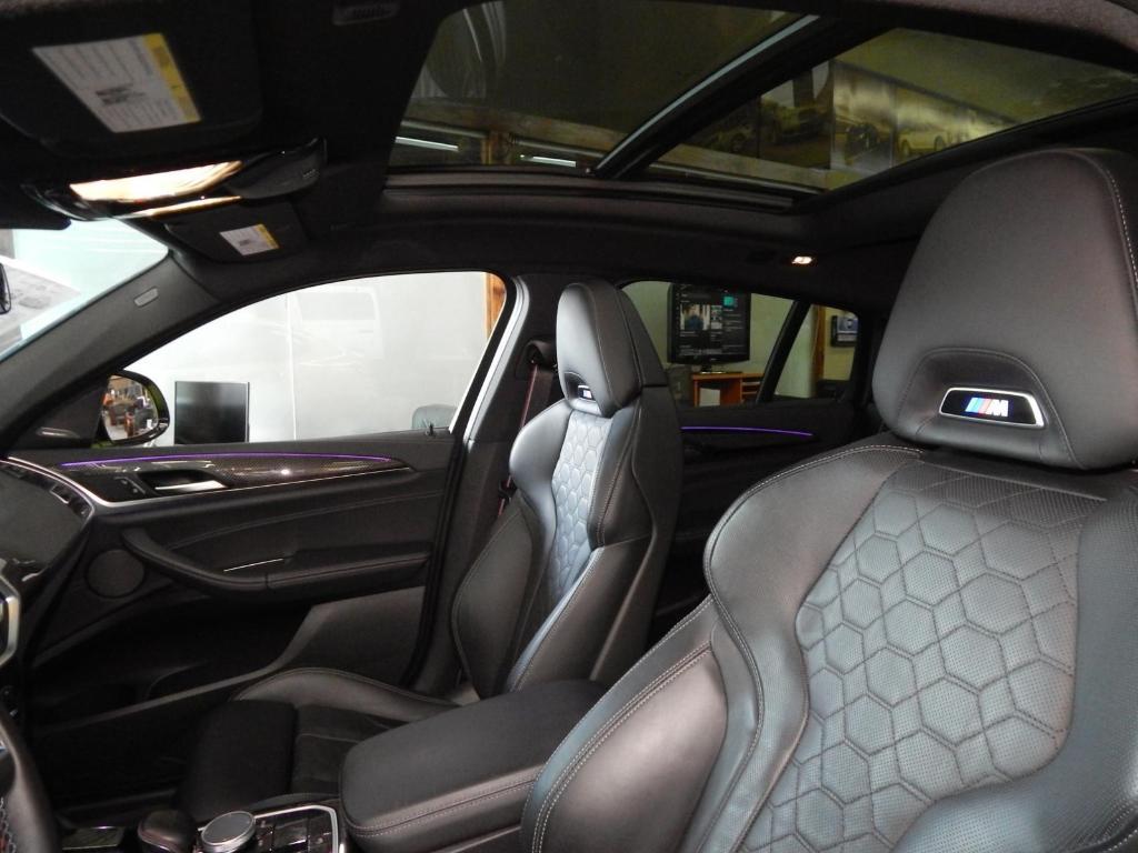 used 2024 BMW X4 M car, priced at $66,895