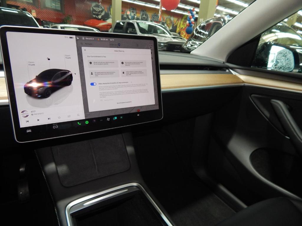 used 2023 Tesla Model Y car, priced at $32,895