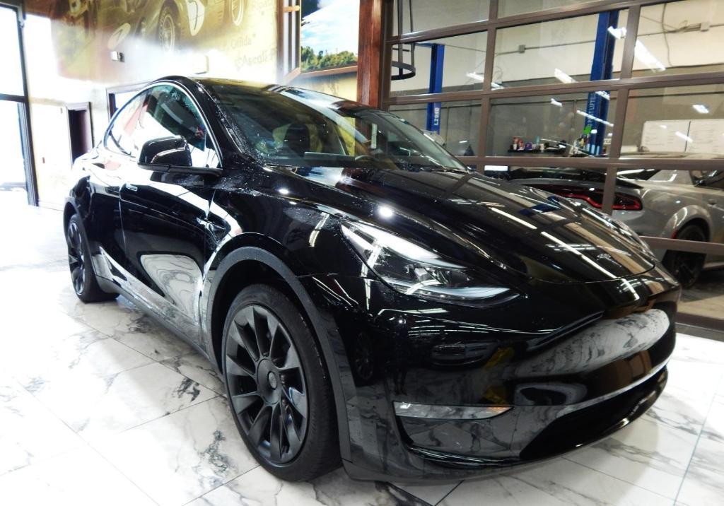 used 2023 Tesla Model Y car, priced at $32,895