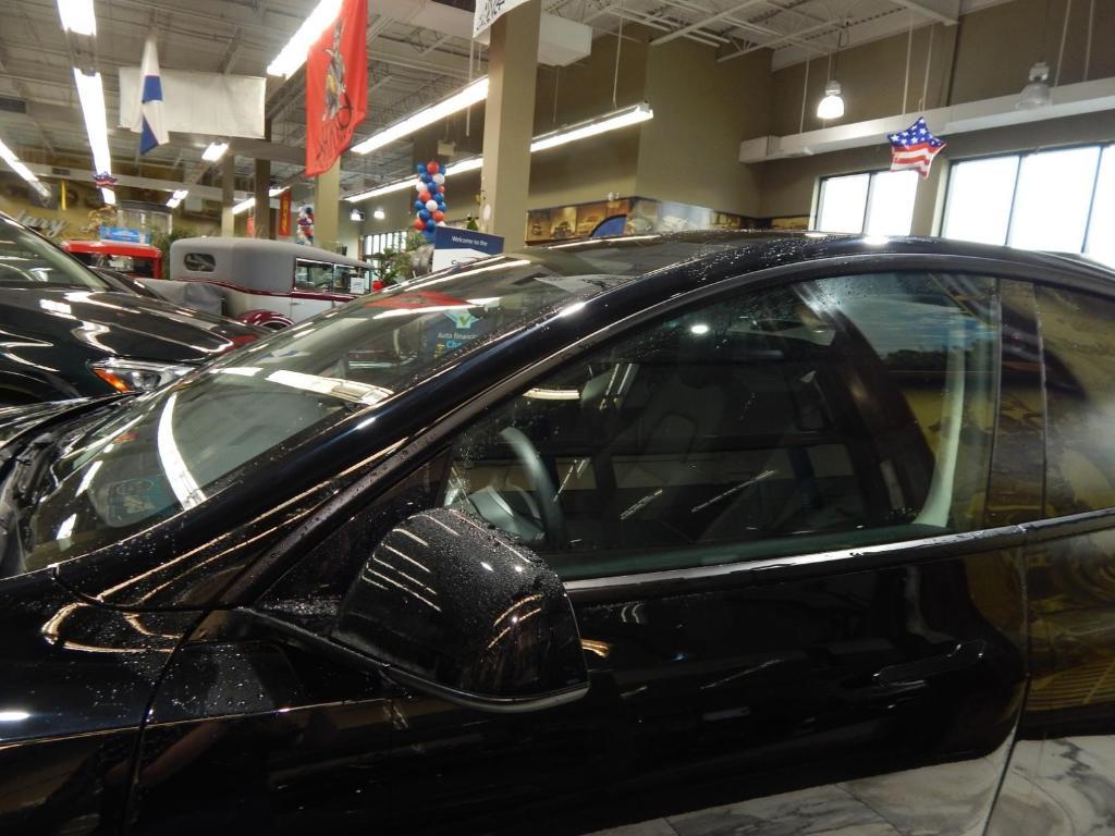 used 2023 Tesla Model Y car, priced at $32,895
