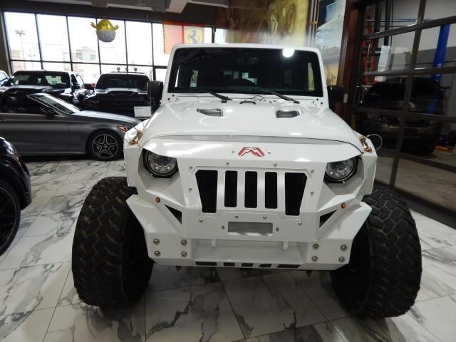 used 2017 Jeep Wrangler Unlimited car, priced at $26,821