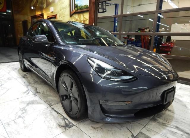 used 2023 Tesla Model 3 car, priced at $23,995