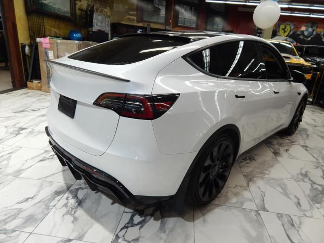 used 2023 Tesla Model Y car, priced at $34,995