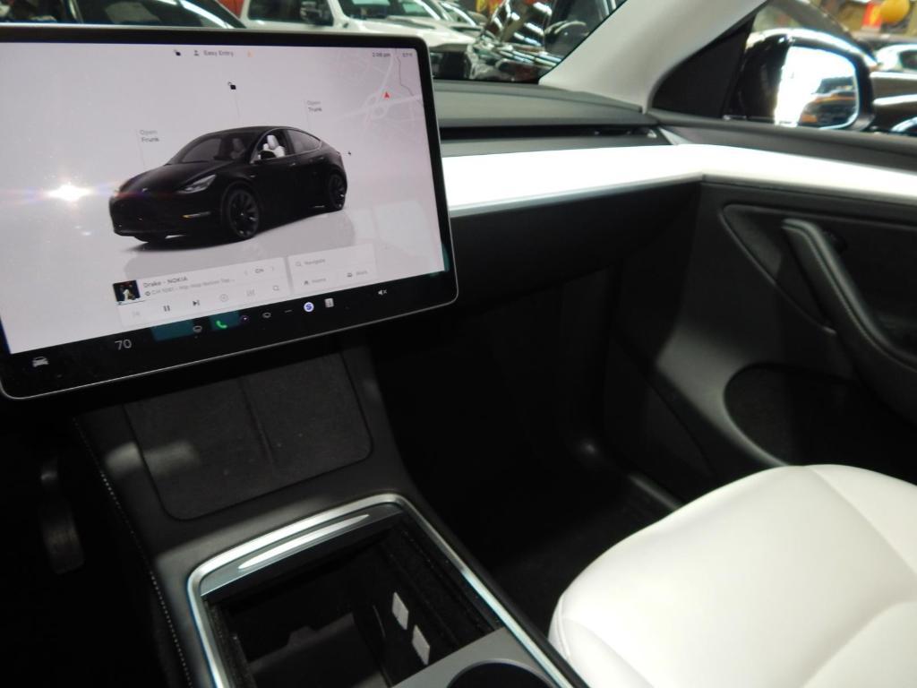 used 2023 Tesla Model Y car, priced at $32,995
