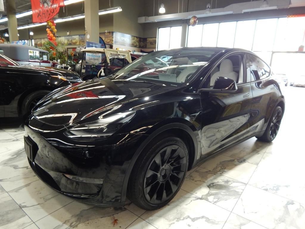 used 2023 Tesla Model Y car, priced at $32,995
