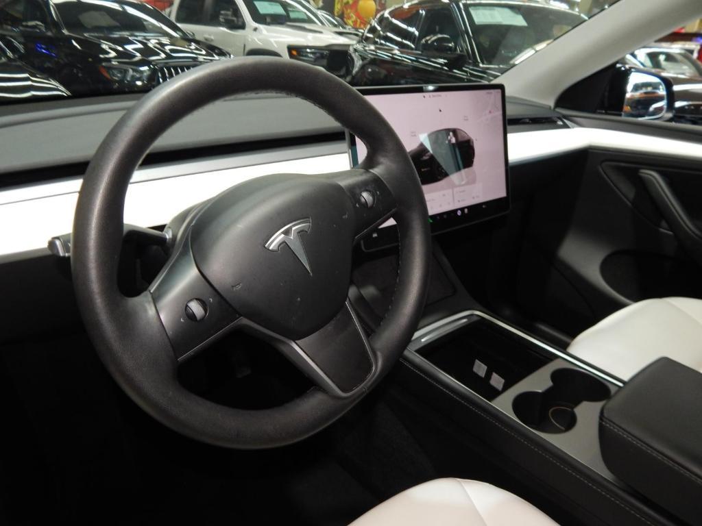 used 2023 Tesla Model Y car, priced at $32,995