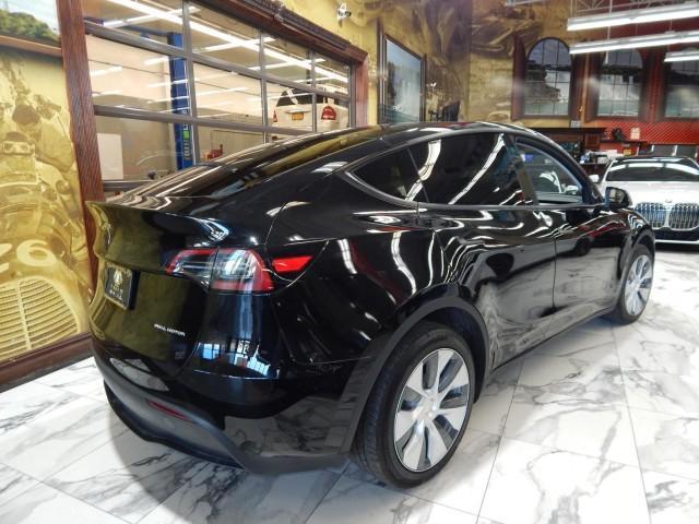 used 2023 Tesla Model Y car, priced at $30,221