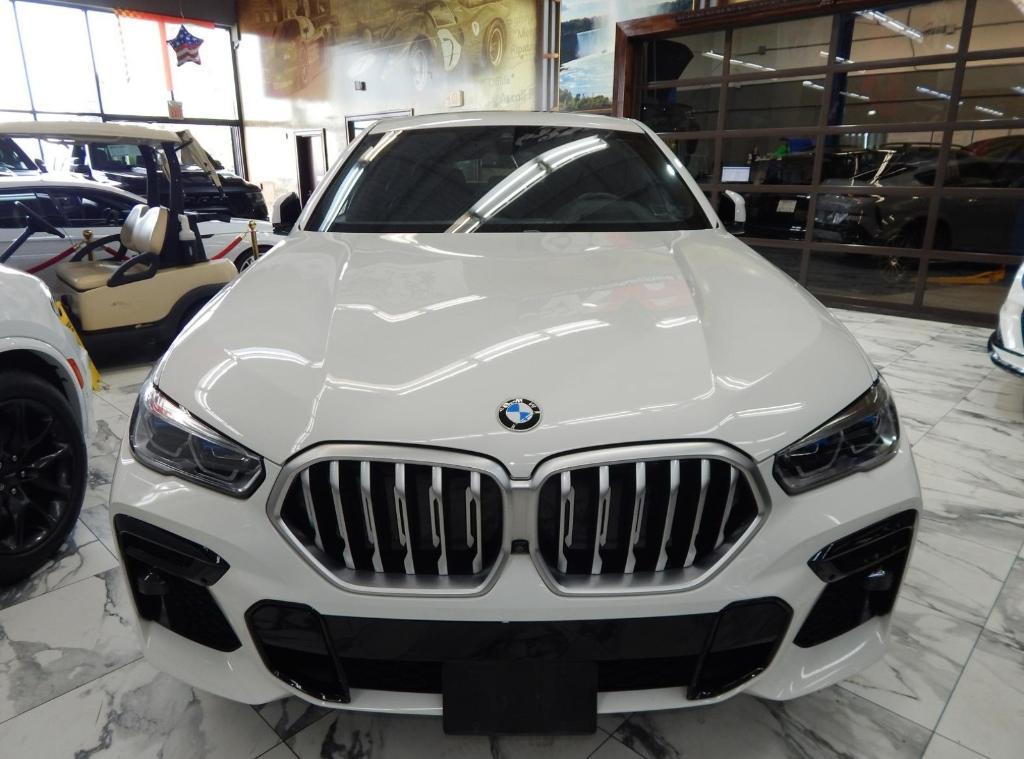 used 2023 BMW X6 car, priced at $55,995