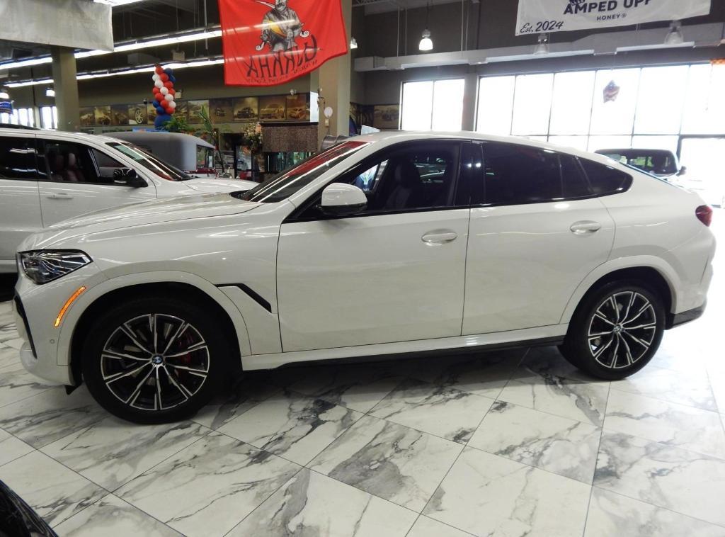 used 2023 BMW X6 car, priced at $55,995
