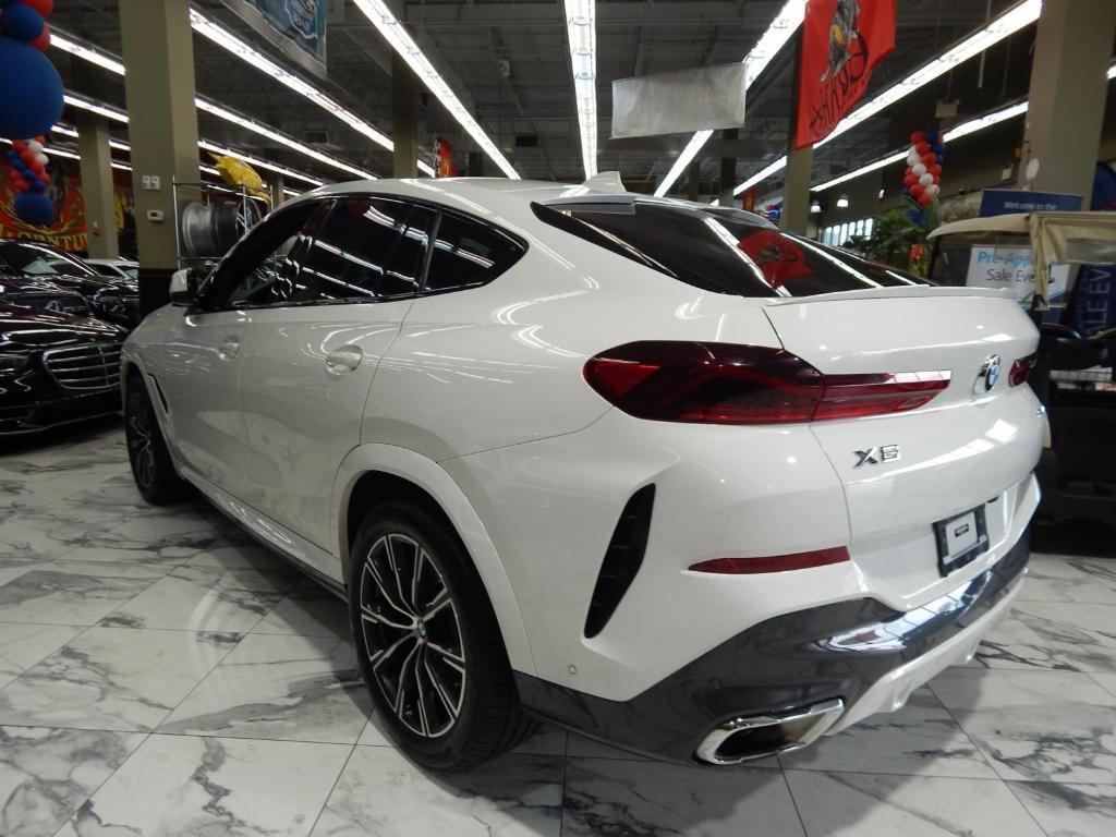 used 2023 BMW X6 car, priced at $55,995