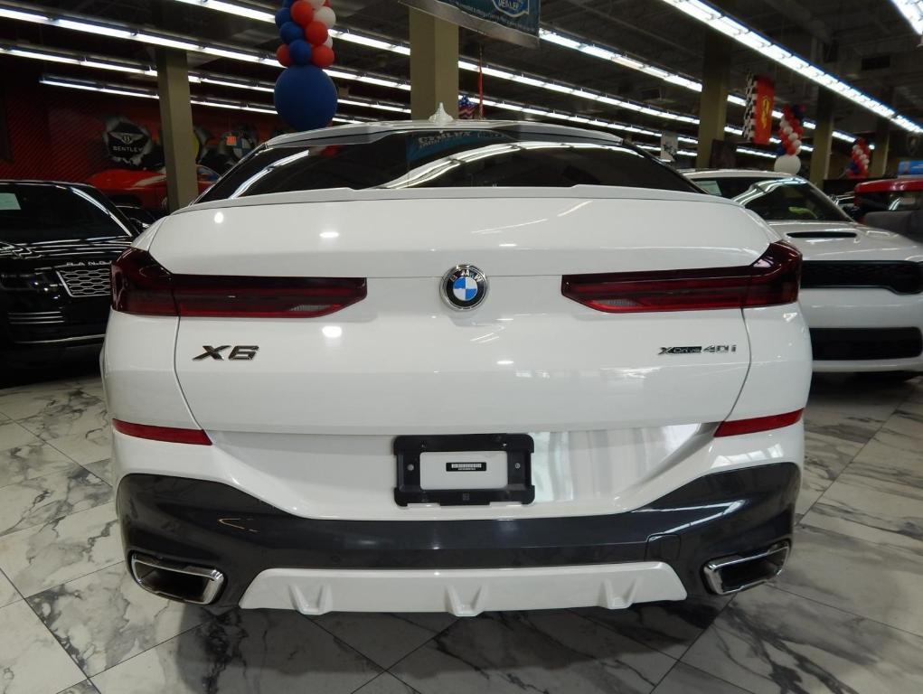 used 2023 BMW X6 car, priced at $55,995