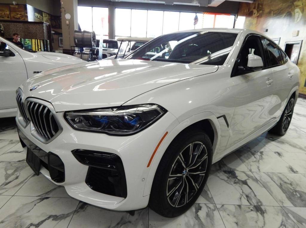 used 2023 BMW X6 car, priced at $55,995