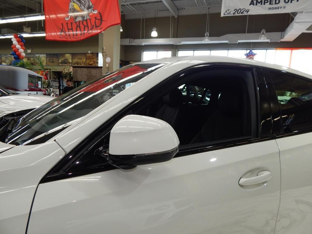 used 2023 BMW X6 car, priced at $55,995