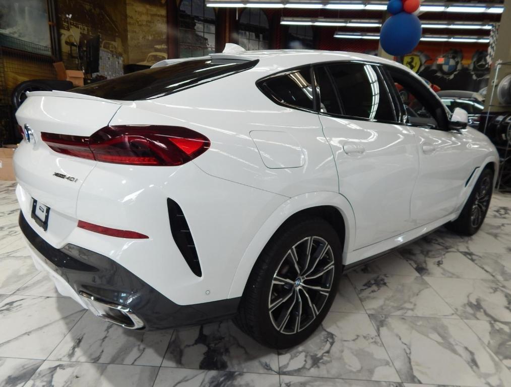 used 2023 BMW X6 car, priced at $55,995