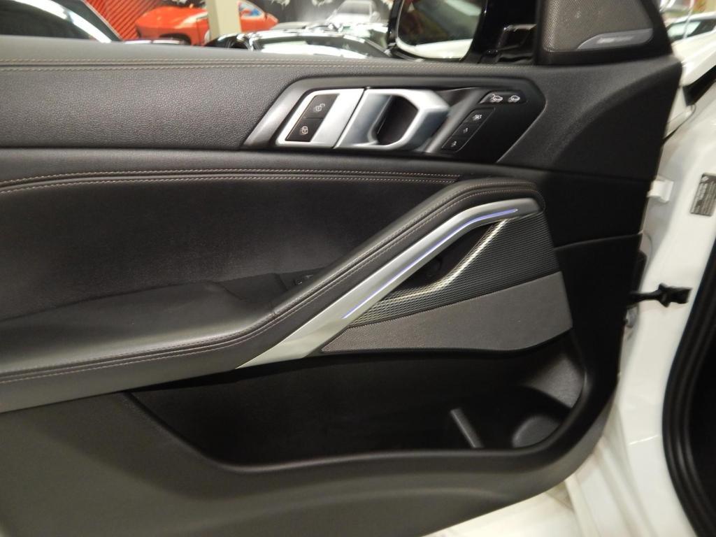 used 2023 BMW X6 car, priced at $55,995