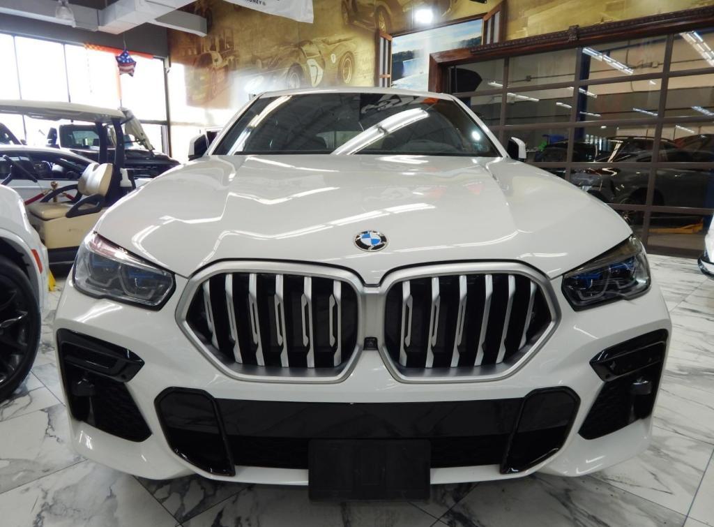 used 2023 BMW X6 car, priced at $55,995