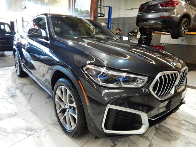 used 2022 BMW X6 car, priced at $58,995