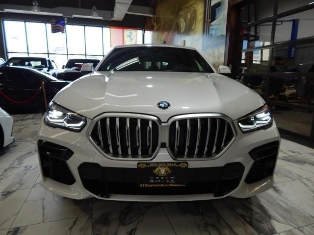 used 2023 BMW X6 car, priced at $57,995