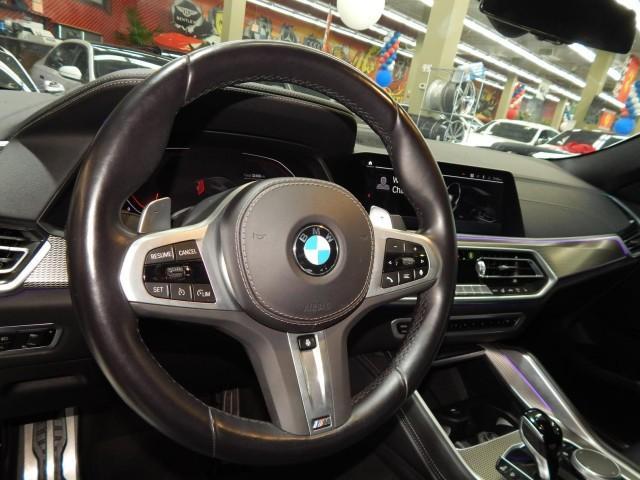 used 2023 BMW X6 car, priced at $57,995