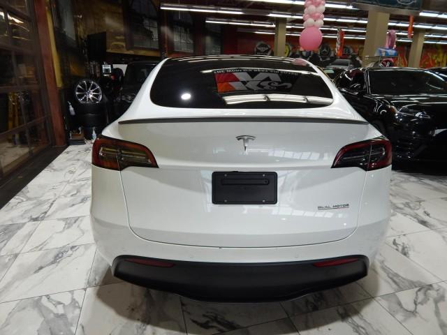 used 2021 Tesla Model Y car, priced at $27,921