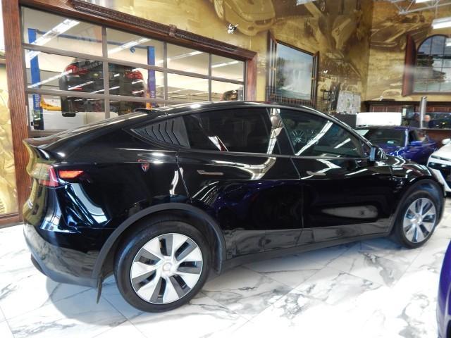 used 2023 Tesla Model Y car, priced at $45,921