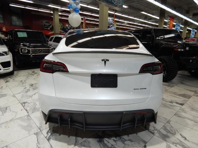 used 2024 Tesla Model Y car, priced at $40,995