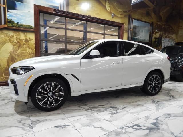 used 2023 BMW X6 car, priced at $53,621