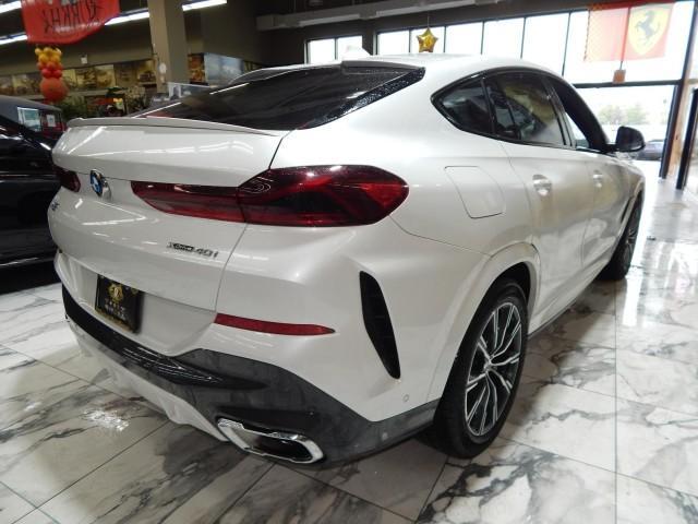 used 2023 BMW X6 car, priced at $53,621