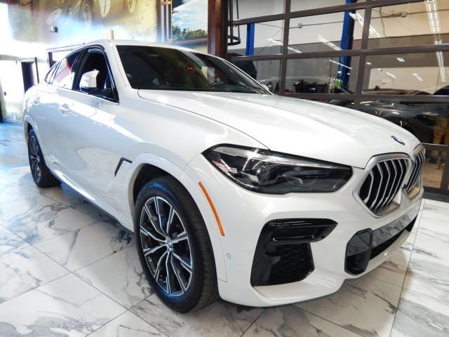 used 2023 BMW X6 car, priced at $51,921