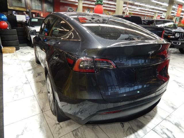 used 2024 Tesla Model Y car, priced at $33,521