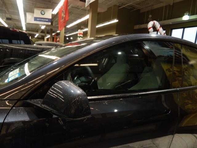 used 2024 Tesla Model Y car, priced at $33,521