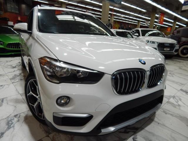 used 2018 BMW X1 car, priced at $16,921