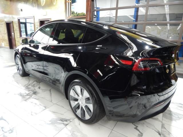 used 2023 Tesla Model Y car, priced at $32,421