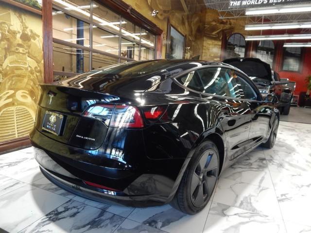 used 2023 Tesla Model 3 car, priced at $30,000