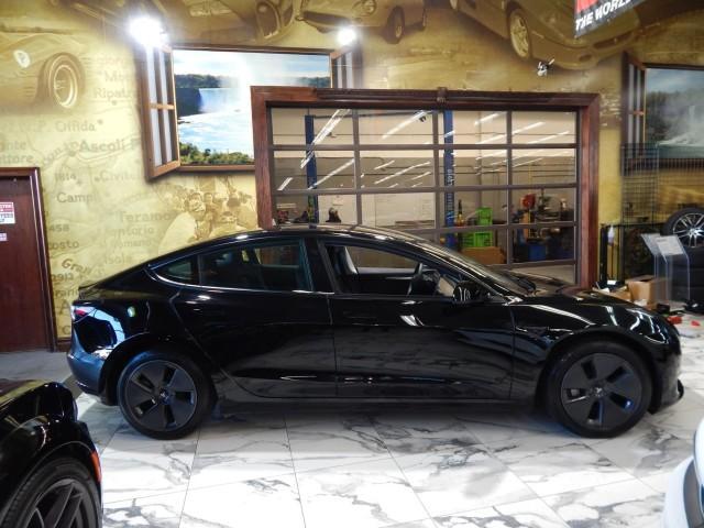 used 2023 Tesla Model 3 car, priced at $30,000