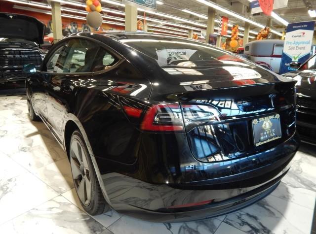 used 2023 Tesla Model 3 car, priced at $30,000