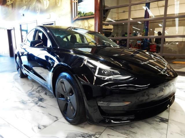 used 2023 Tesla Model 3 car, priced at $30,000