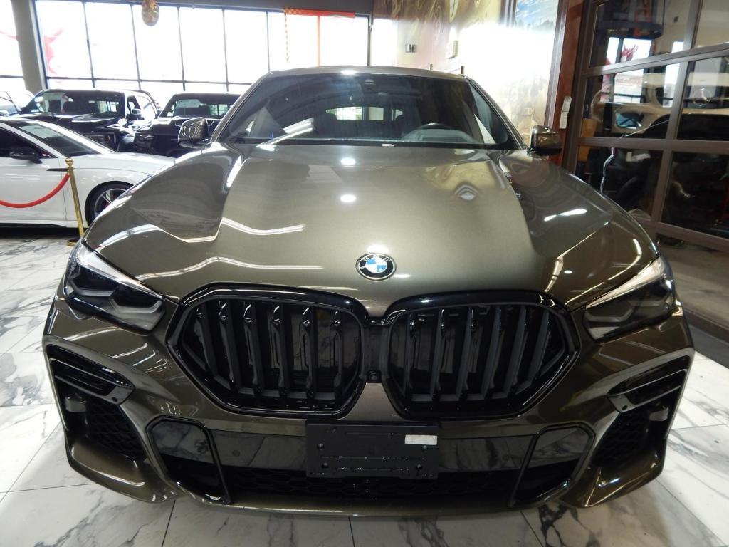 used 2022 BMW X6 car, priced at $55,895