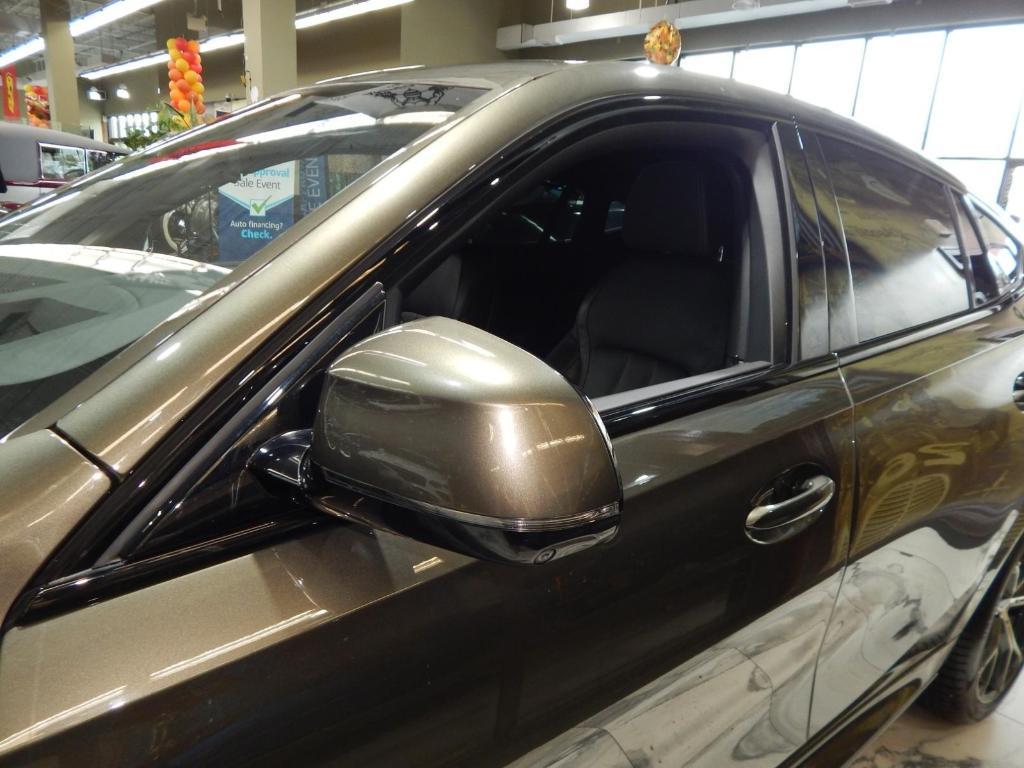 used 2022 BMW X6 car, priced at $55,895
