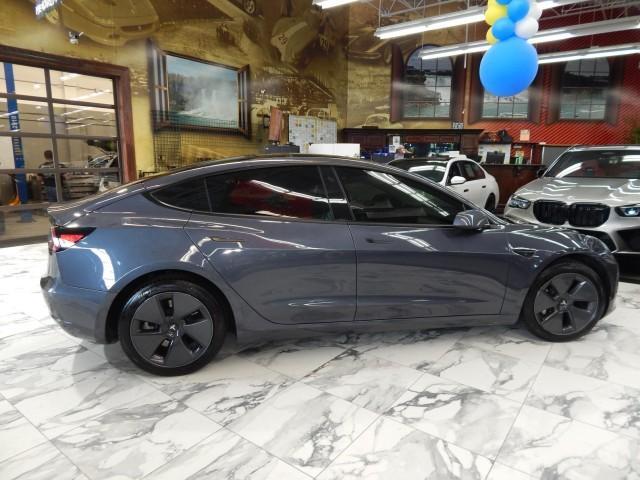 used 2023 Tesla Model 3 car, priced at $25,121