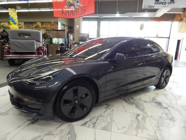 used 2023 Tesla Model 3 car, priced at $25,121