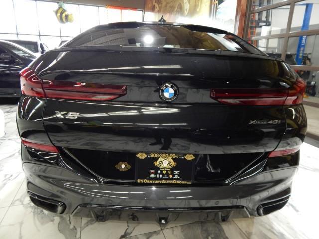 used 2022 BMW X6 car, priced at $51,921