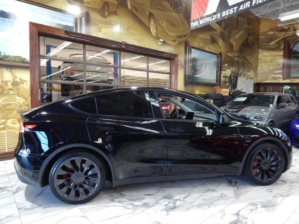used 2023 Tesla Model Y car, priced at $30,000