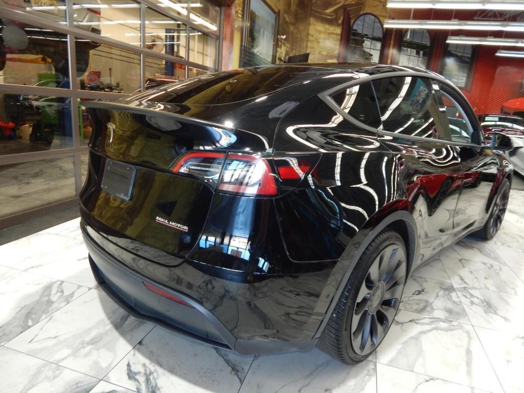 used 2023 Tesla Model Y car, priced at $30,000