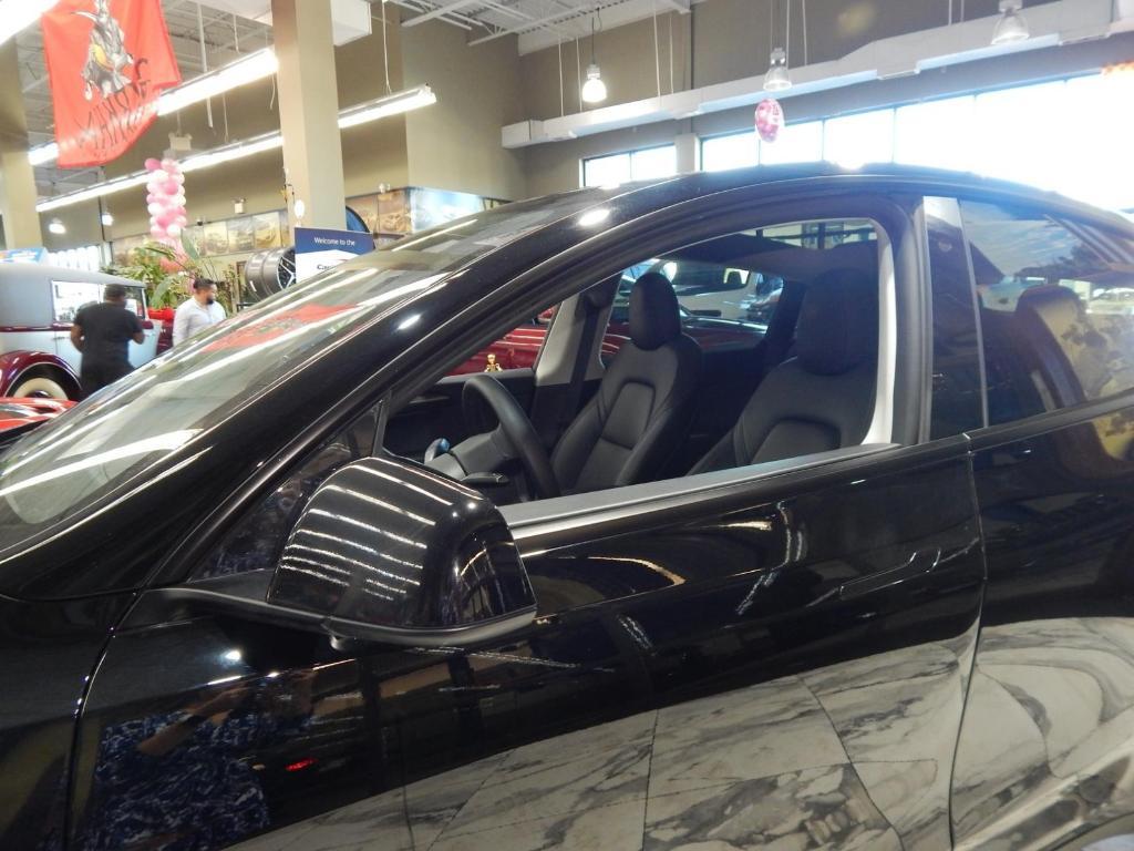 used 2023 Tesla Model Y car, priced at $30,000